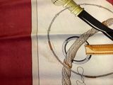 a drawing of a knife and a rope on a piece of paper