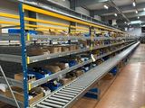 many shelves with boxes on them in a warehouse