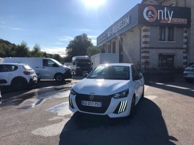 a white car that is parked in front of a building