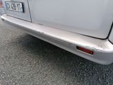 a white car parked on the side of the road