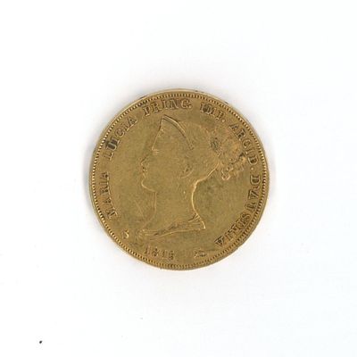 a gold coin with a picture of a woman on it