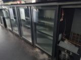 many glass doors that are open in a room