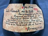 a label on a bottle of wine on a table