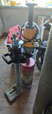 a machine that is sitting on the floor next to a chair