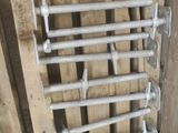a picture of a bunch of pipes and wires in a room