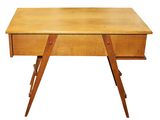 a small wooden desk with a drawer on top of it