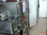 an image of a commercial kitchen with stainless steel appliances