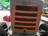 a tractor that is sitting in a garage