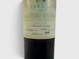a bottle of wine that is sitting on a table