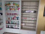 a large display of cosmetics products in a store