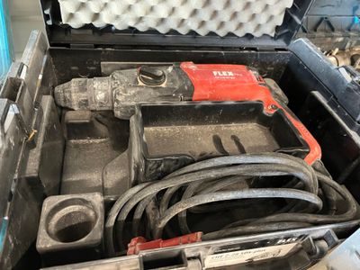 a tool in a tool box with a bunch of wires