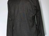 grey pinstripe blazer jacket on a mannequin mannequin mannequin mannequin mannequin mannequin mannequin manne