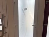 a picture of a door with frosted glass on it