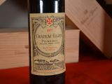 a bottle of wine that is sitting on a table