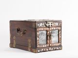 a small wooden box with two pictures inside of it