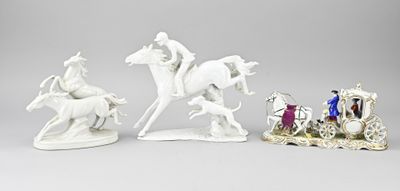 three porcelain figurines of horses and a man on a horse