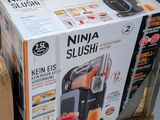 a box of ninja slush sitting on a cart