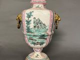 an image of a vase with a painting on it on a table
