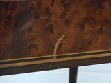 a close up of a table with a wooden top