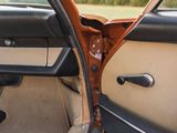 the interior of a car with the door open and the door handle open