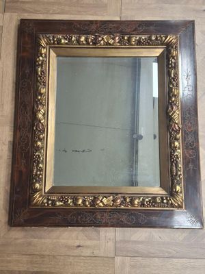 a picture of a mirror on the floor in a room