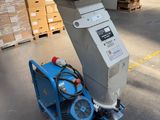 a machine that is sitting in the middle of a warehouse