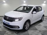 une photo d'une dacia blanche garée dans un garage