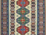 a rug with a multicolored design on a white background