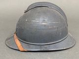 a helmet that is sitting on the ground