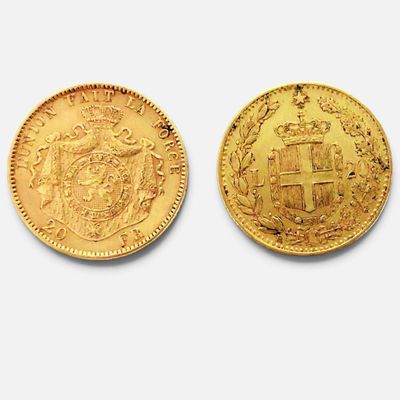 deux pièces d'or, dont l'une porte un blason et l'autre un blason de