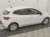 a picture of a white car parked in a garage