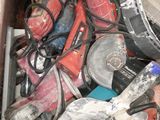 a pile of assorted tools and tools in a bin