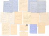 several pieces of paper with handwriting written on them on a white surface