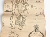 a map on the table next to some books