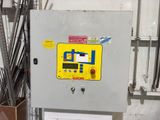 an electrical panel with a yellow sign on it
