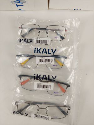 three pairs of glasses in plastic bags on a white surface