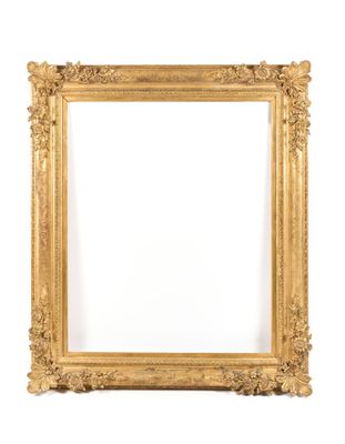 an antique gold frame with a white background
