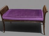 a bench with a purple cushion on top of it