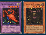 four different cards of different colors and designs on a blue background