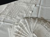 a lot of doily on a table with a fan