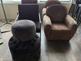 two chairs and a stool in a room