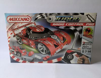 toys are in a box on a white surface