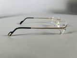 two pairs of glasses on a table with a white background