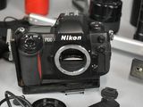 a camera that is sitting on a table next to other cameras