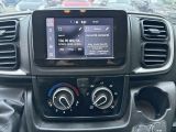 the dashboard of a car with a digital display in the center