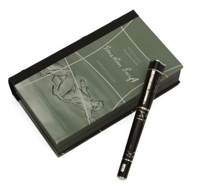 un stylo posé sur un livre