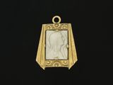un pendentif en or avec la photo d'une femme dans un cadre