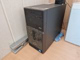 a desktop computer sitting on top of a wooden floor