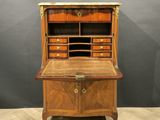 an old wooden desk with drawers and drawers on top of it