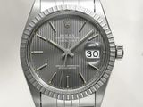 une image représentant une montre Rolex argentée sur fond blanc